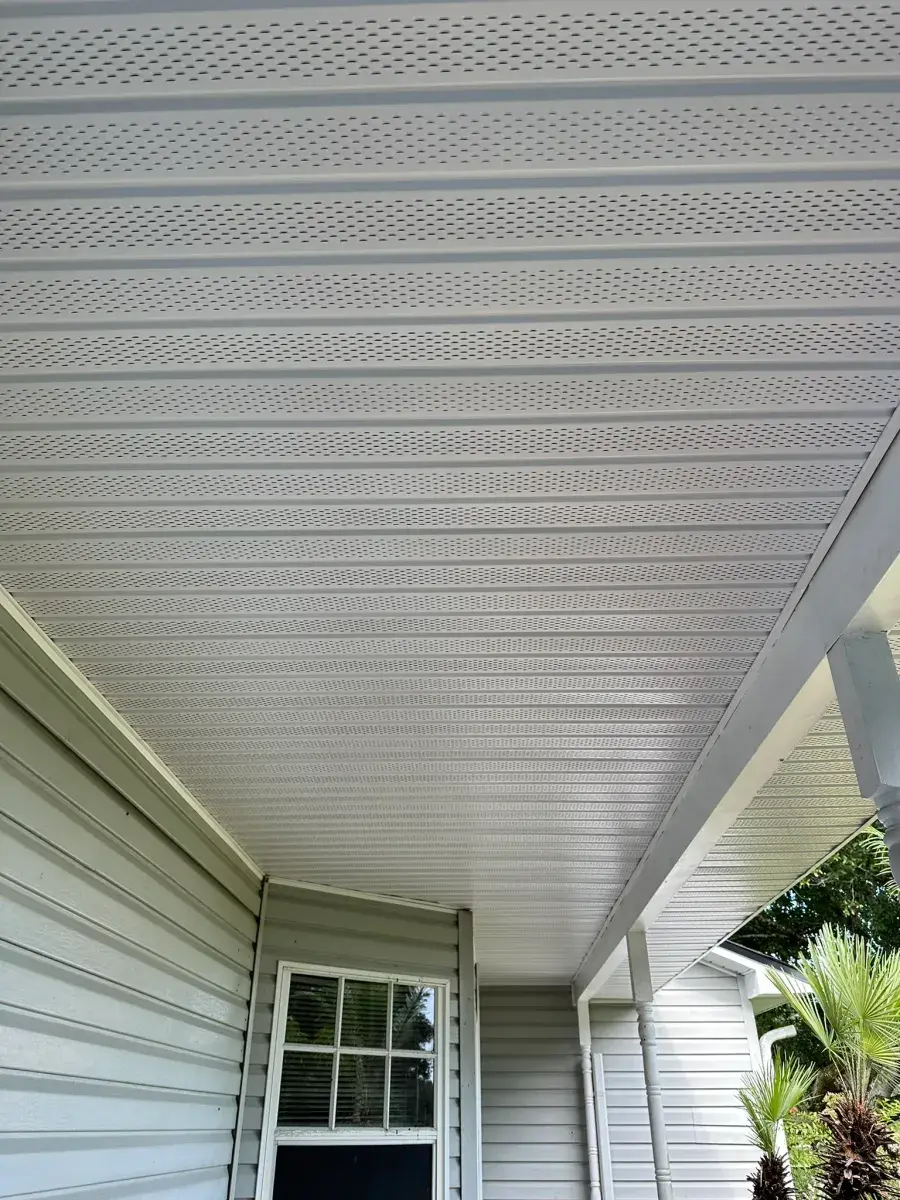 Vented soffit panels for attic airflow